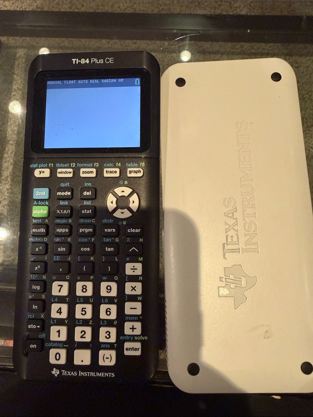 TI-84 Plus CE Graphing Calculator - Black with White Cover